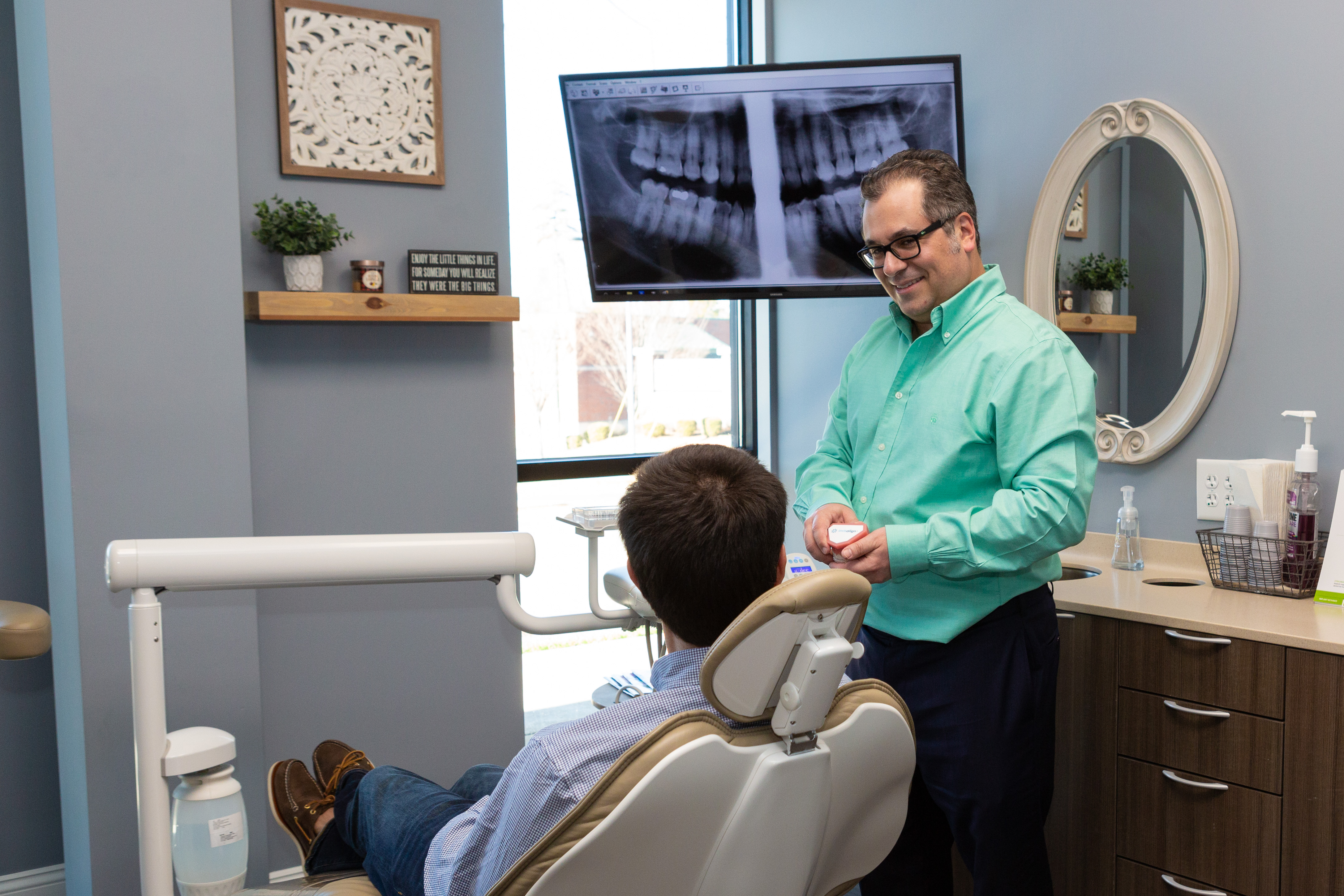 Dr. Andre Brun in the patient care area - LandMark Dentistry Matthews location